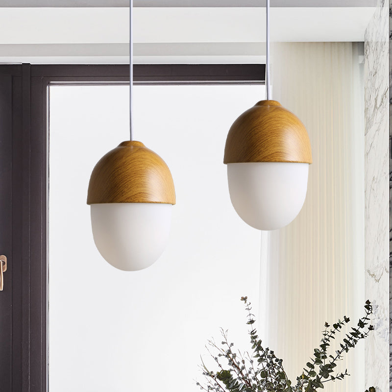 LumiNut - Moderne nøddeformet pendel med glas- og træelementer
