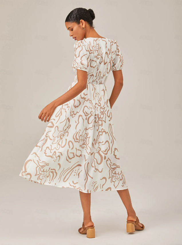 Liora - Elegant Kjole med Kunstnerisk Blomsterprint