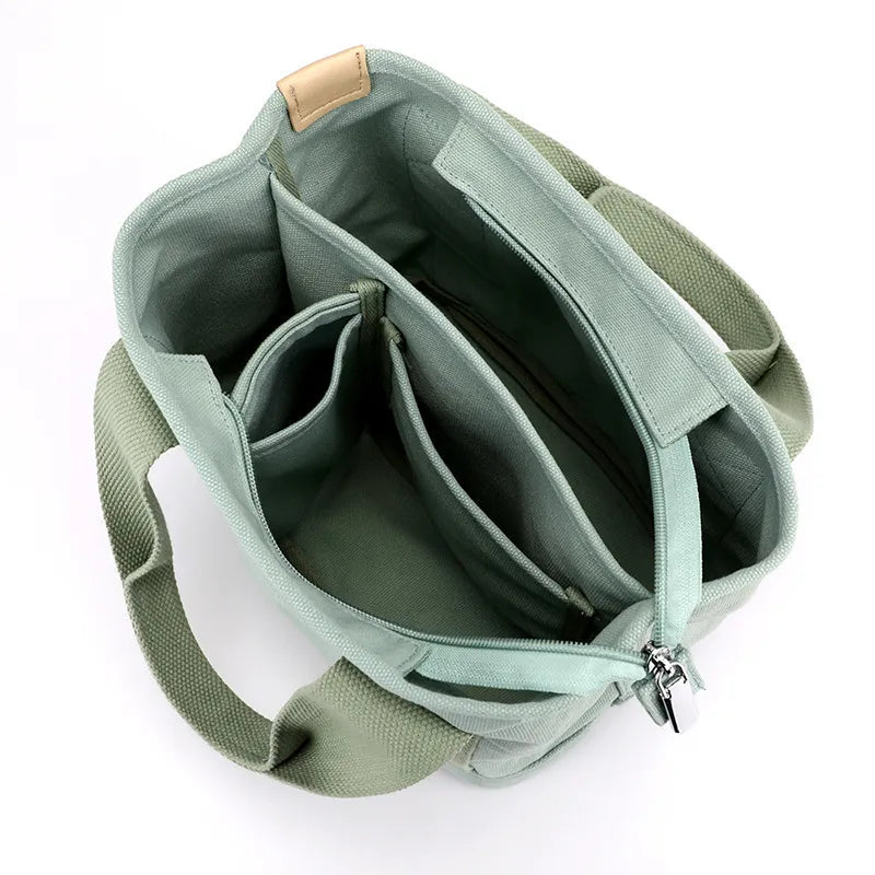 Brinna - Elegant crossbody-taske i lærred